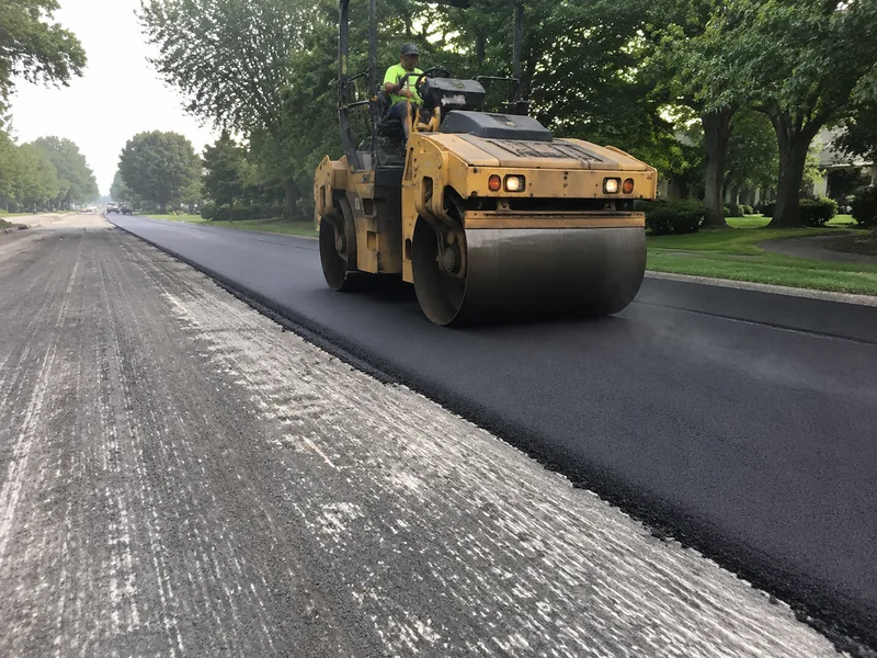 Asphalt resurfacing overlay being rolled in Lafayette IN